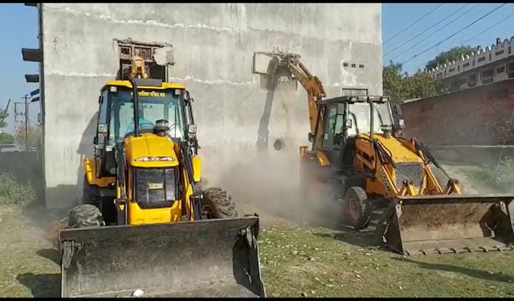 Bulldozer runs at Mukhtar Ansari's son's house, demolishes two-storey building