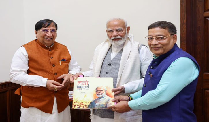 Copy of Namo Impact presented to Prime Minister Modi