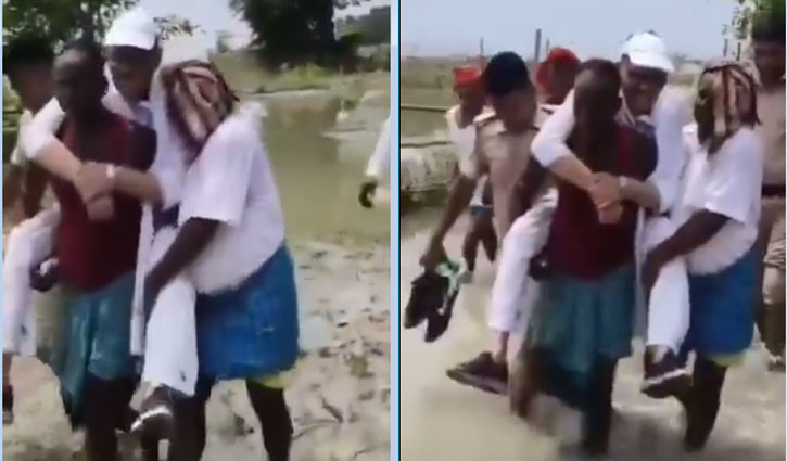 Congress MP Tariq Anwar climbed on the backs of villagers to inspect the floods in Bihar