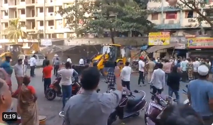 Bulldozer action on illegal shops in Mira Road near Mumbai after clash