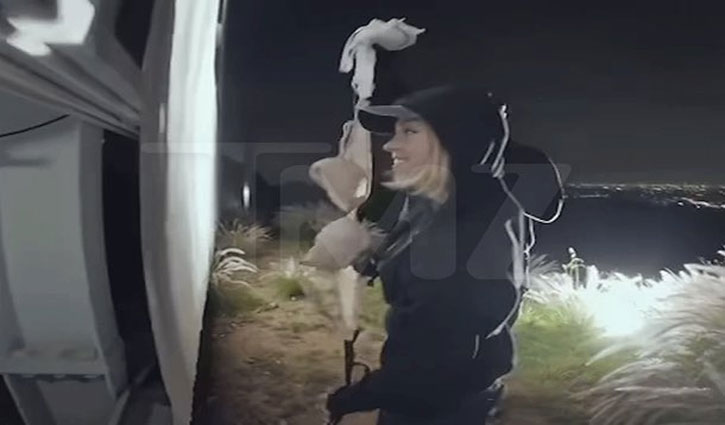 Sydney Sweeney's controversial stunt: Hangs underwear on the Hollywood sign, sparking fears of legal action.