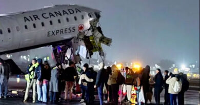 An Air Canada Express aircraft and a truck collided on the runway at New York's LaGuardia Airport; several people were injured