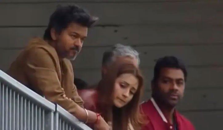 A video of Tamil Nadu CM, Vijay, and Trisha watching Ajit Kumar's race at Silverstone has gone viral.